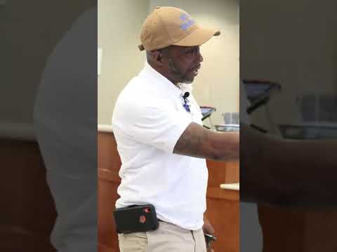 Marcus Dawson demonstrates the power of Blue Bomber All-purpose cleaner